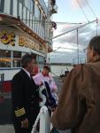 Ed-gives-flags-to-Belle-capt